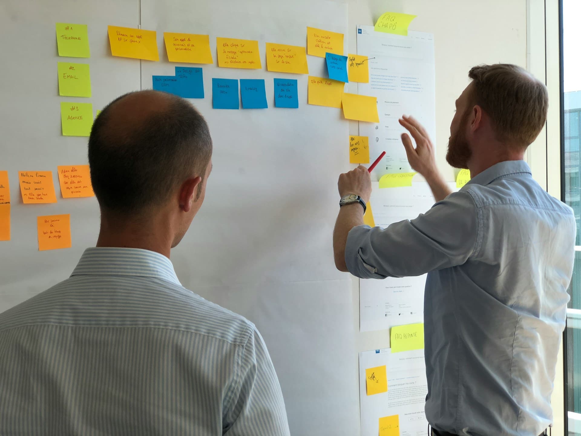 A founder collaborating with their team on a project