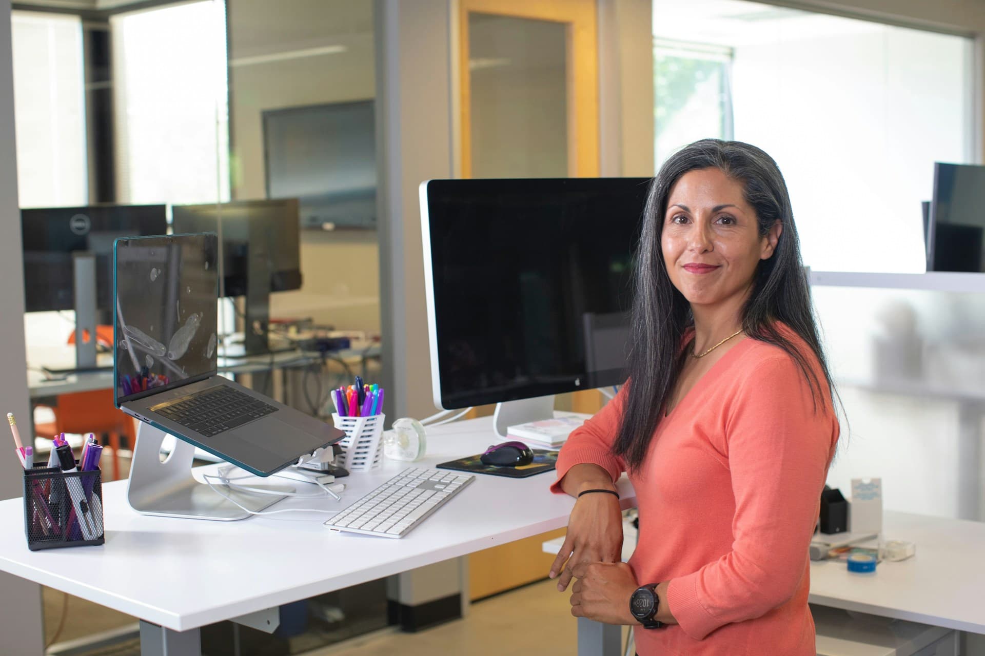A business owner sitting alone in thought at a desk