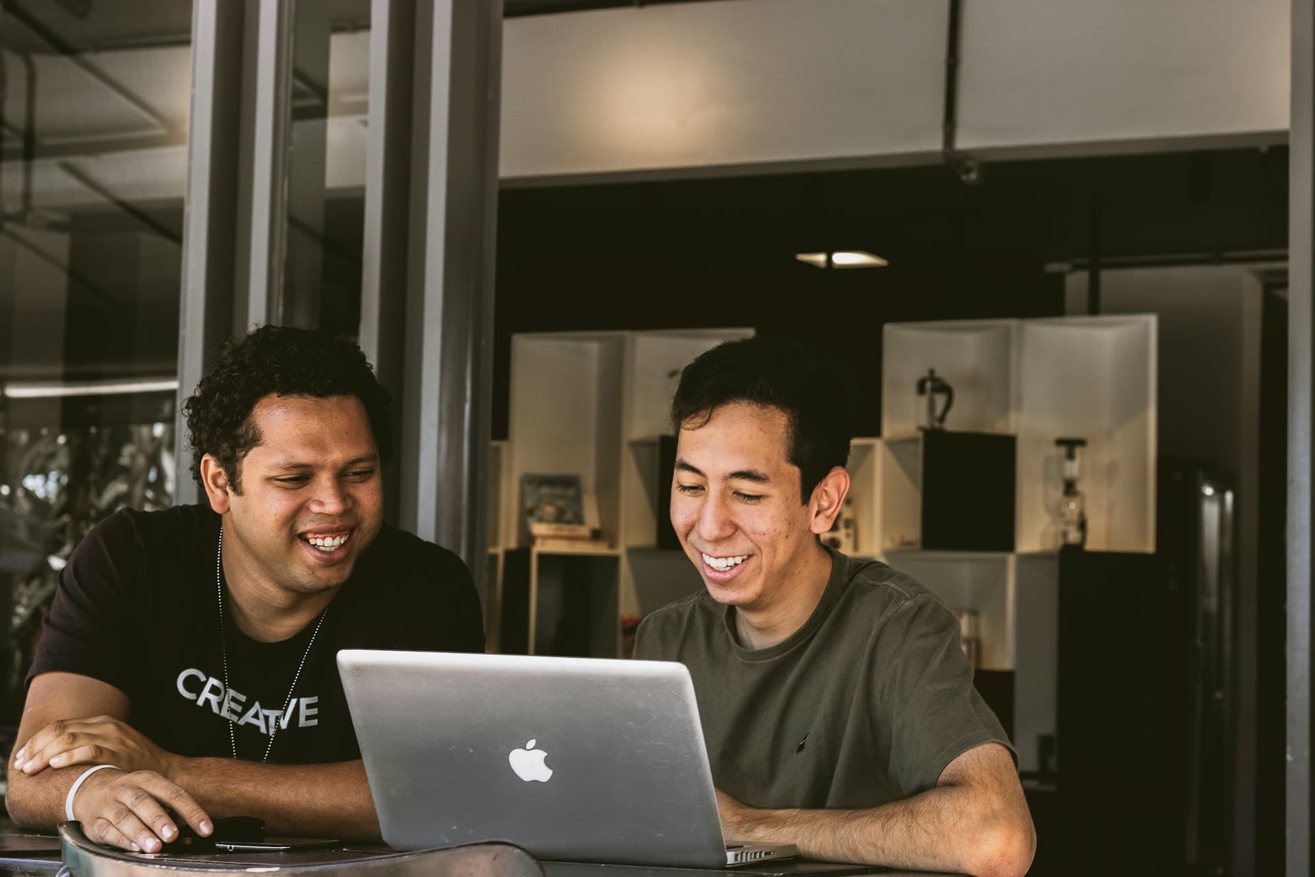 Professionals collaborating around a table in a modern office